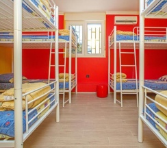 Кровать в общем номере в Outlanders Tribe Hostel