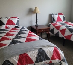 Кровать в общем номере в Cute And Cozy Hostel