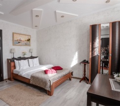 Студия-улучшенный двухместный номер с двуспальной кроватью в Олимпия