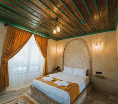 Двухместный люкс двуспальная кровать в La Casa Cave