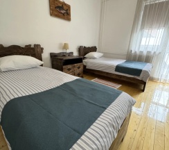 Двухместный номер Standard Мансарда 2 отдельные кровати в Rybinka