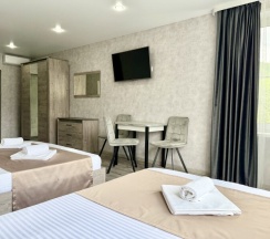 Трехместная комната комфорт в Корнилофф от Травел Хотелс Антураж