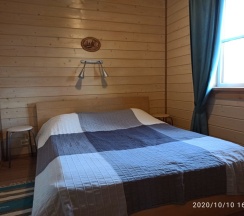 Коттедж с балконом и с красивым видом из окна в Гостевой дом