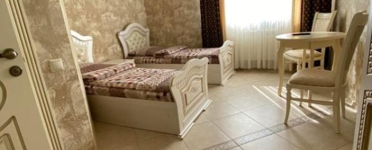 Номер стандарт с 2 односпальными кроватями в Корона