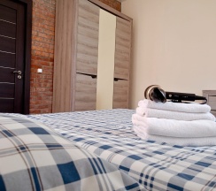 Апартаменты/Семейный трёхкомнатный номер с большими двуспальными кроватями в Морской