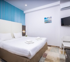 Делюкс с кроватью KING SIZE для 2 гостей в Мио