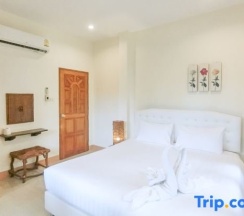 Двухместный люкс двуспальная кровать в Arthit-Thai Orchard & Resort