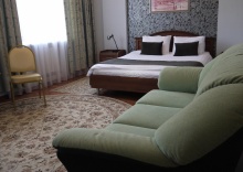 Номер стандарт семейный с 1 двуспальной кроватью в Старый Сталинград