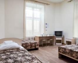 Кровать в 4-местном общем номере в Smart Hotel KDO Саранск