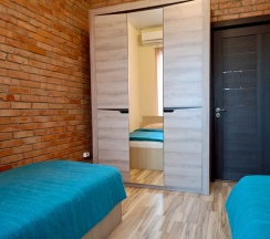 Апартаменты/Семейный четырехместный трехкомнатный номер с раздельными кроватями в Морской