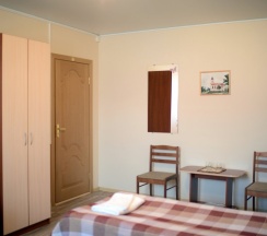 Трехместный номер с 3 односпальными кроватями в Вояж