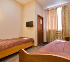 Двухместный номер с 2 двумя отдельными кроватями и собственной ванной комнатой в Аллан