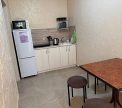 Двухместные апартаменты с красивым видом из окна двуспальная кровать в Мелис