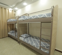 Кровать в общем номере в The Top Hostel