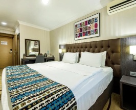 Двухместный номер двуспальная кровать в Shymkent Grand Hotel