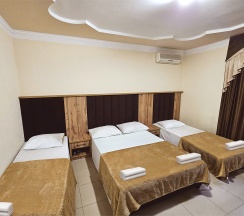 Четырехместный номер с отдельным выходом во двор в Guest house city center