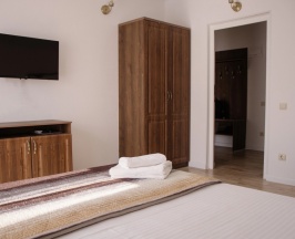 Четырёхместные апартаменты с 2 комнатами с балконом и с видом на горы в Талион