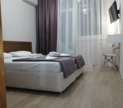 Комната стандарт улучшенная с 2 односпальными кроватями и балконом в Адлерский