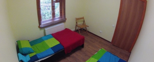 Кровать в общем номере в Серпейка