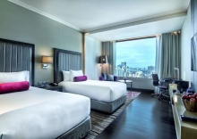 Трёхместный семейный номер Deluxe с 2 комнатами 2 отдельные кровати в Radisson Blu Plaza Bangkok