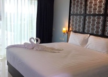 Двухместный номер Deluxe с балконом двуспальная кровать в Phuket Chinoinn Hotel