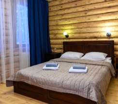 Двухместный номер в избе с 2 комнатами с красивым видом из окна двуспальная кровать в Вкс