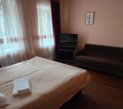 1-комнатные апартаменты стандарт с 2 односпальными и 1 двуспальной кроватью в Гостевой дом