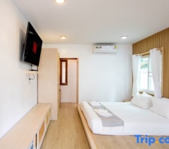 Двухместная вилла двуспальная кровать в Sangthong Resort