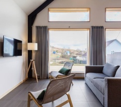 Двухместный коттедж двуспальная кровать в Family Barn Karvala