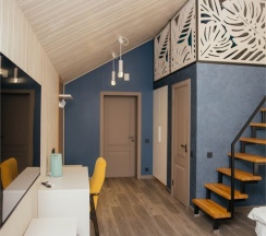 Двухуровневый Джуниор Сюит на втором этаже со своей зоной отдыха в Игуана