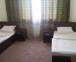 Двухместный  стандарт с двумя раздельными кроватями  в Даймохк