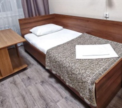 Кровать в 4-местном общем номере в Smart Hotel KDO Миасс