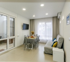 Апартаменты "На листопадной 15А" в Саквояж