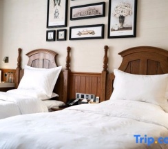 Двухместный номер Standard 2 отдельные кровати в Yake Town Holiday Hotel (Dehui Branch)