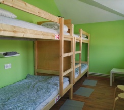 Кровать в общем номере в Дом
