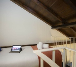 Четырёхместный семейный номер Standard с балконом в Casual Ilbira Granada Hotel