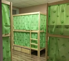 Кровать в общем номере (общая ванная комната) в В библиотеке