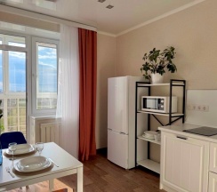 Апартаменты с панорамным видом на 13 этаже в Призма