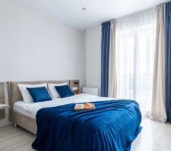 Номер Superior в Квартира на сутки Минск Маяк Метро 3 минуты Бесконтактное заселение Wi-Fi Кухня объединена с жилой зоной Отдельная спальня