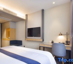 Двухместный номер Business двуспальная кровать в Motel168 Shanghai Qi Bao Inn