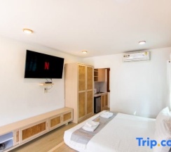 Двухместная вилла двуспальная кровать в Sangthong Resort
