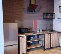 Апартаменты студия с 1 двуспальной кроватью и диваном в Бестужев