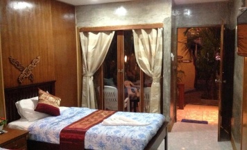 Двухместный номер Standard с видом на сад двуспальная кровать в Ruan Mai Naiyang Beach Resort