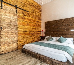 Номер с кроватью размера "king-size" в Loft Garden