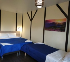 Трёхместный номер Deluxe в Солнечный ветер