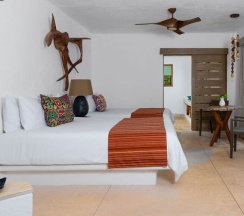 Четырёхместный номер Palapa Oasis в Shangri-la Caribe Beach Village Resort