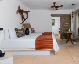 Четырёхместный номер Oasis в Shangri-la Caribe Beach Village Resort