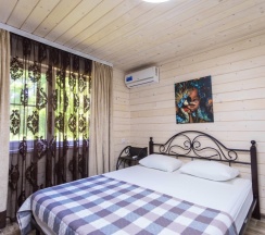 Домик в лесу в Villa la vita