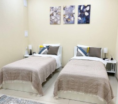 Номер с двумя полутора спальными кроватями (без окна) в Дисней