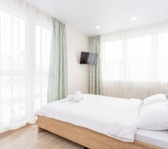 Номер Superior в Квартира на сутки Маяк Минск Метро 5 мин Wi-Fi Кондиционер Кухня объединена с жилой зоной Отдельная спальня Отчётные документы